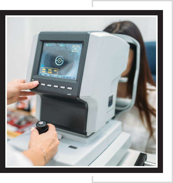 A woman gets her eyes examined from an optometrist.