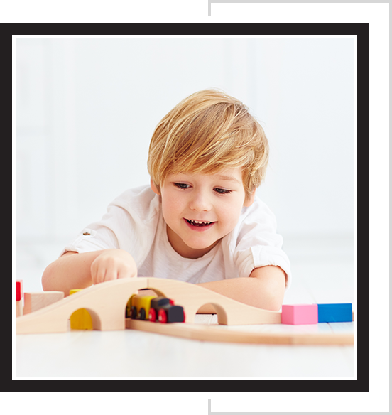 boy playing with toys