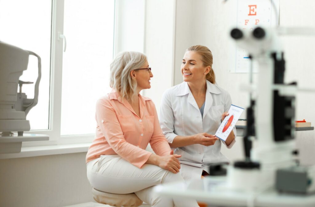 A woman and her optometrist discuss her vision in the optometrist's office