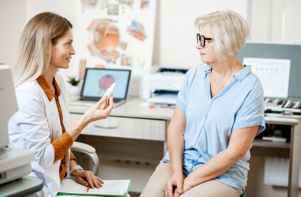 Eye doctor discussing dry eye treatment with a patient.